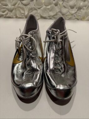 Nike Silver Sneakers with Gold Swoosh Lace-Up